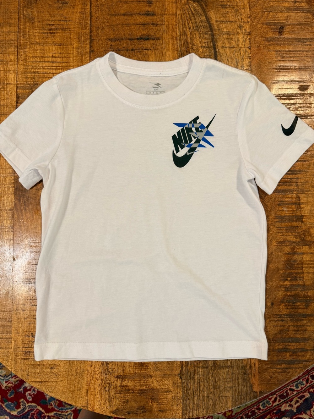 Boys Nike White Tee with Blue and Black Swoosh Star Logo